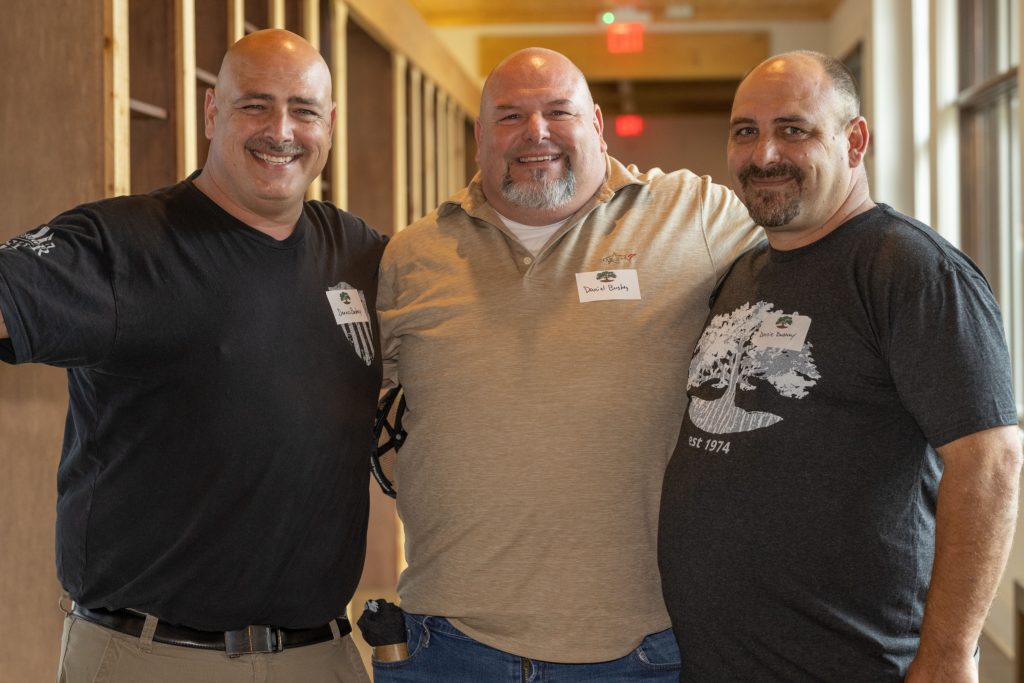Picture of Dennis, Daniel, and Donnie Bushey standing together